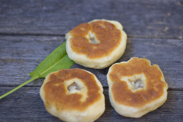 a pie with meat and onions