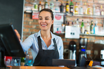 Woman working at cafe
