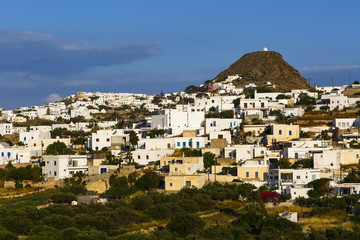 Fototapeta na wymiar Triovasalos village and castle hill on Milos island in Greece. 