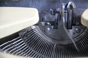 Typewriter is a device used to print letters on paper before the ancient technology. Used in business
