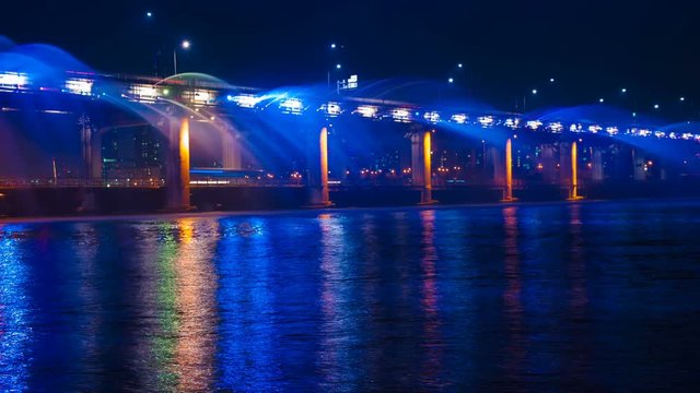 Banpo bridge rainbow fountain show at night in Seoul, Soth Korea.  4K TIMELAPSE
