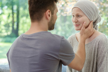 Husband touching wife's face
