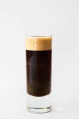 shot of espresso in a glass isolated on white background