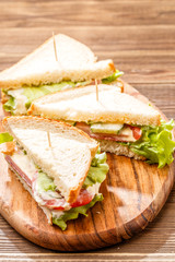 Burgers with toothpicks and sausage