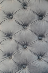 Gray sofa surface texture.
