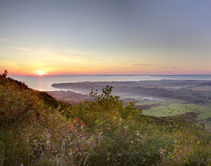 View from the top of a lookoff or hill at sunrise