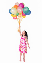 Asian little Chinese girl flying with colorful balloons