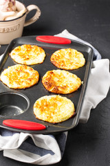 Cottage cheese muffins with eggs, healthy diet food, soft focus, vertical
