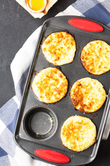 Cottage cheese muffins with eggs, healthy diet food, soft focus, vertical
