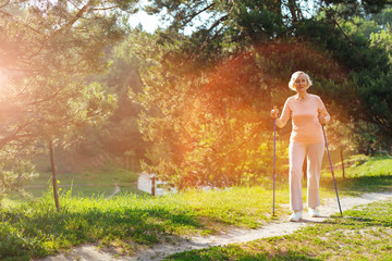 Positive aged woman leading healthy lifestyle