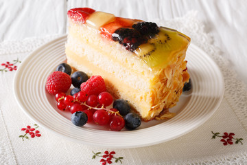 Slice of fruit jelly cake closeup on a table. Horizontal