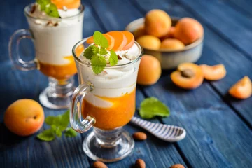 Foto op Plexiglas Layered apricot and cream cheese dessert © noirchocolate