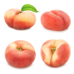 Set of flat peaches isolated on white.