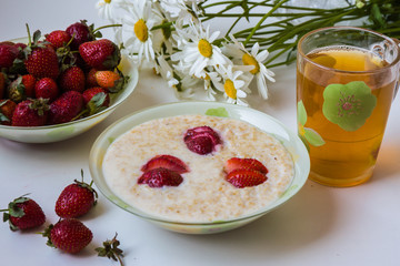 Oatmeal with strawberries - healthy Breakfast.