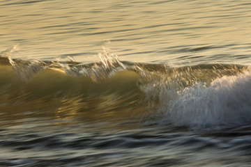 Waves on the ocean captured with a slow shutter speed to bring a sense of movement and power.