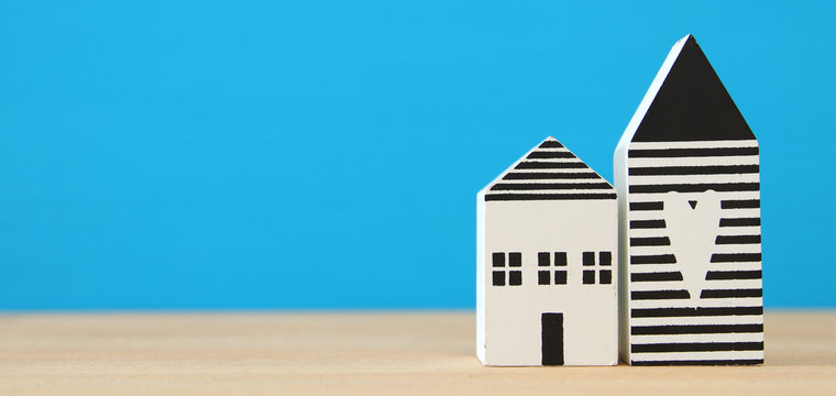 small house model over wooden floor. selective focus