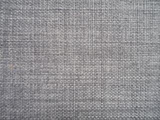 Fototapeta na wymiar Close up of grey fabric or nylon texture.