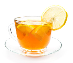Isolated transparent cup of tea with lemon slice