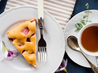 Strawberry pie from mixed flour. Spring summer still life. Sweet food festive treat. Flat lay
