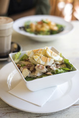 sar salad on wooden table