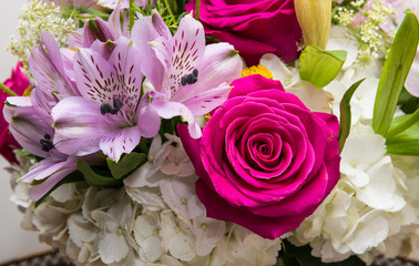 Flower bouquet close up with roses & lilies