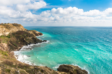 Summer day landscape with the sea and mountains.