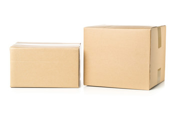 Two corrugated cardboard carton parcels