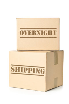 Two Carton Parcels With Overnight Shipping Imprint