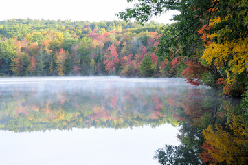 Misty waters in autumn at Burr Pond State Park in Torrington Connecticut. 