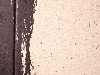 Dripping paint at an wall, texture.