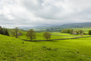 Fototapeta na wymiar A sweeping landscape deep in the Yorkshire Dales.