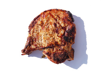 Colorful close up photo of  isolated delicious peace of steak meat cooked on grill fire on white background