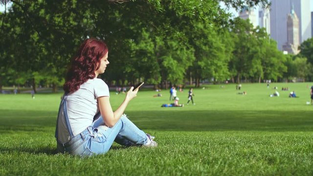 Young girl doing selfie in Central Park