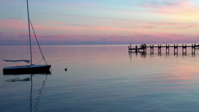 Sunset Sailboat in water
