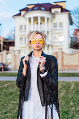 Fototapeta premium beautiful girl in a leather jacket
