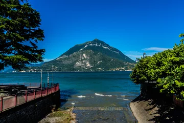 Fototapeten Beautiful view of picturesque Lake Como - a very popular tourist attraction. Lombardy, Italy. © dbrnjhrj