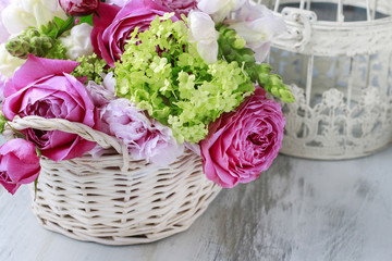 Floral arrangement with pink roses, peonies and matthiola flowers