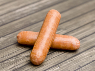 Hot Dogs Isolated on a Wooden Table