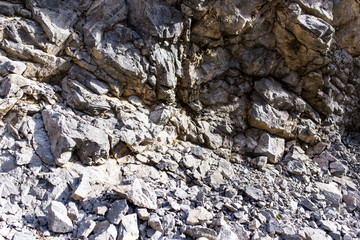Stone cliffs in the mountains as a background