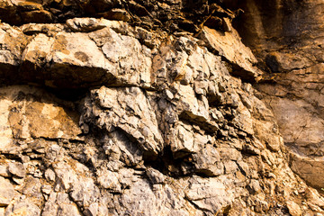 Stone cliffs in the mountains as a background