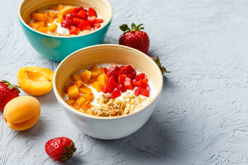 Homemade yogurt with granola, apricot and pine nuts