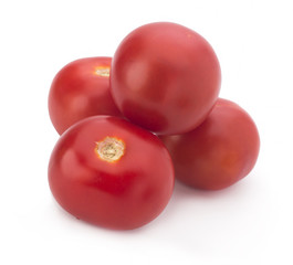 Red tomatoes on a white background