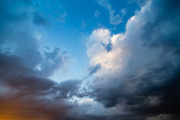 Fototapeta premium Clouds at sunset as background