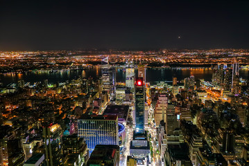 Aerial view of Manhattan Midtown West at night
