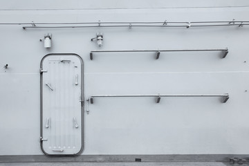 Battleship door with metal handrails background