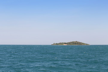 Fototapeta na wymiar Deserted island in the sea.