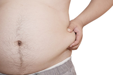 Man grabbing his fat belly