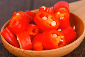 Chilli Pieces on Wood