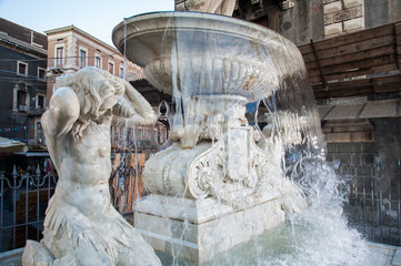 Landmarks of Catania, Sicily: closeup view of the Amenano fountain by the main Dome Square