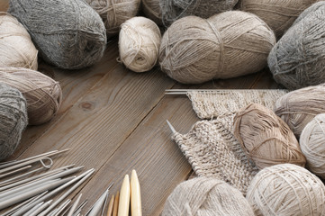 Various neutral colored yarn and needles
